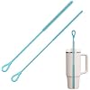 Two flexible silicone cleaning brushes for glass water pipes, shown beside a glass container